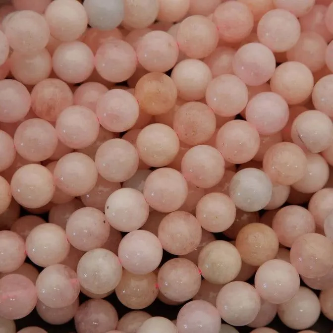 pink amazonite · raw ruby · freshwater pearls — close-up