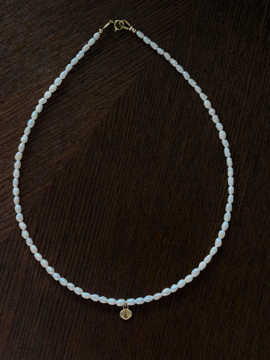 Necklace Sunrise · Timeless — white pearls · gold heart charm
